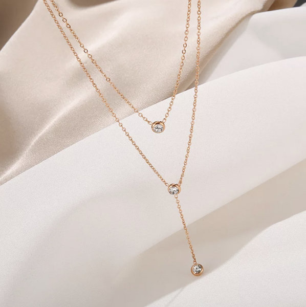Multilayered Rose gold , necklace with Zircons