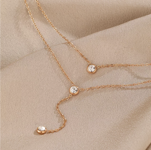 Multilayered Rose gold , necklace with Zircons