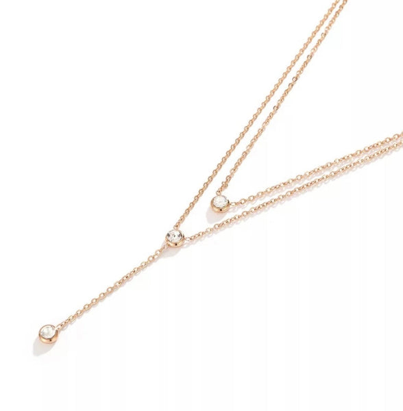 Multilayered Rose gold , necklace with Zircons